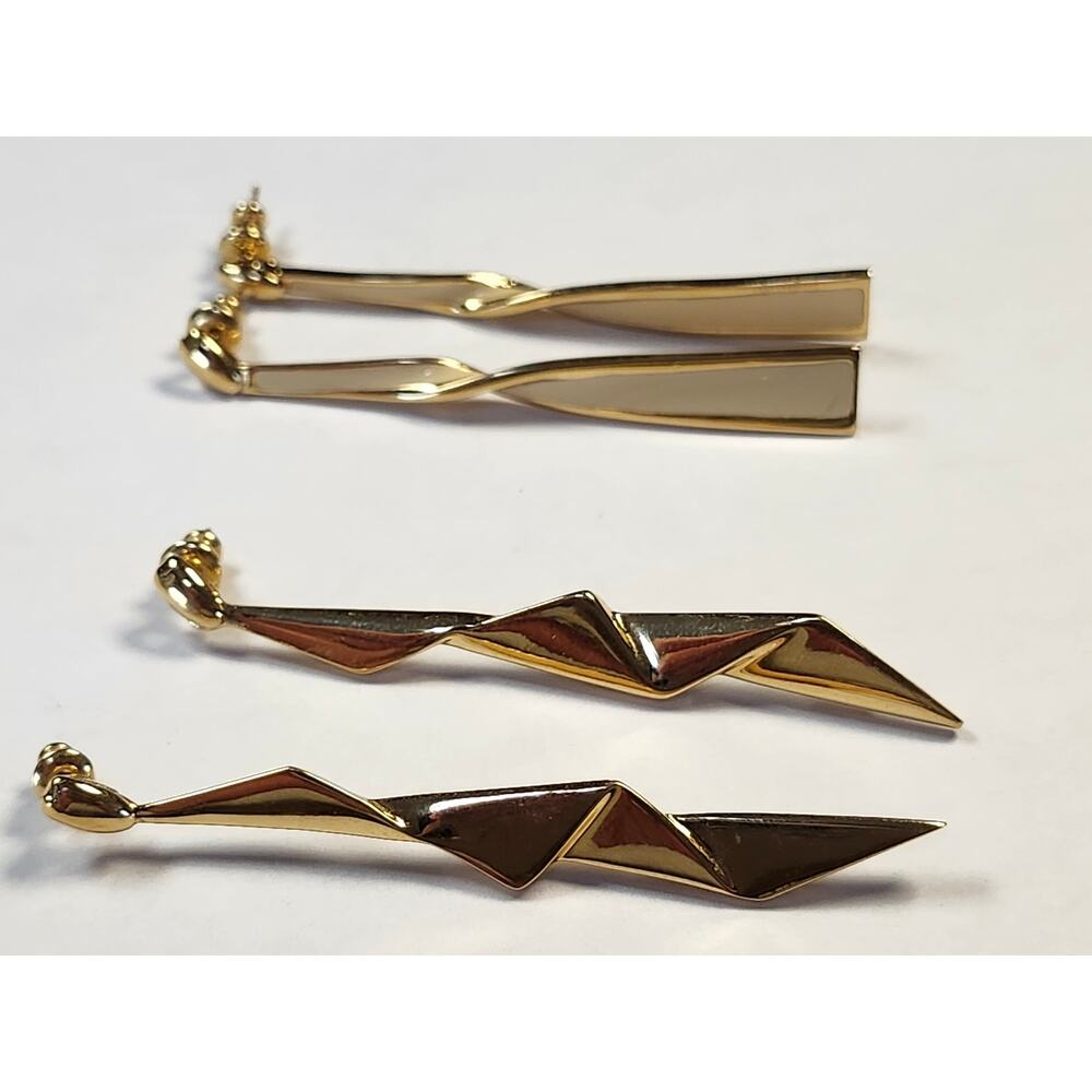 Goldtone enamel dangle pierced earring with hinged posts for movement vintage